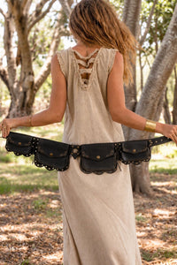Black leather pocket belt with multiple brass-studded flap pockets and a central buckle