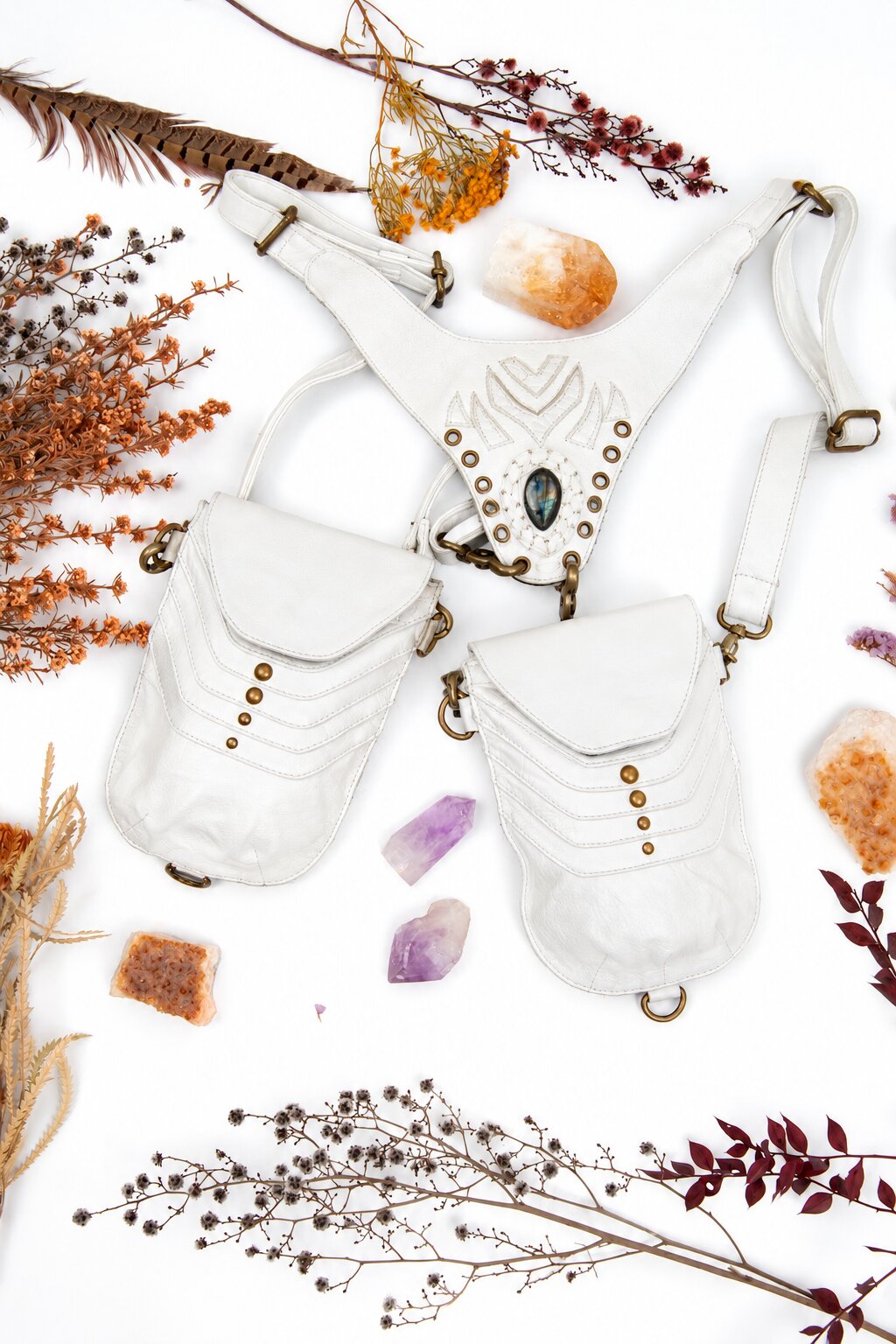 White leather holster with labradorite cabochon and multiple strap-and-pouch pieces