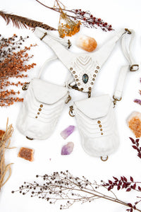 White leather holster with labradorite cabochon and multiple strap-and-pouch pieces